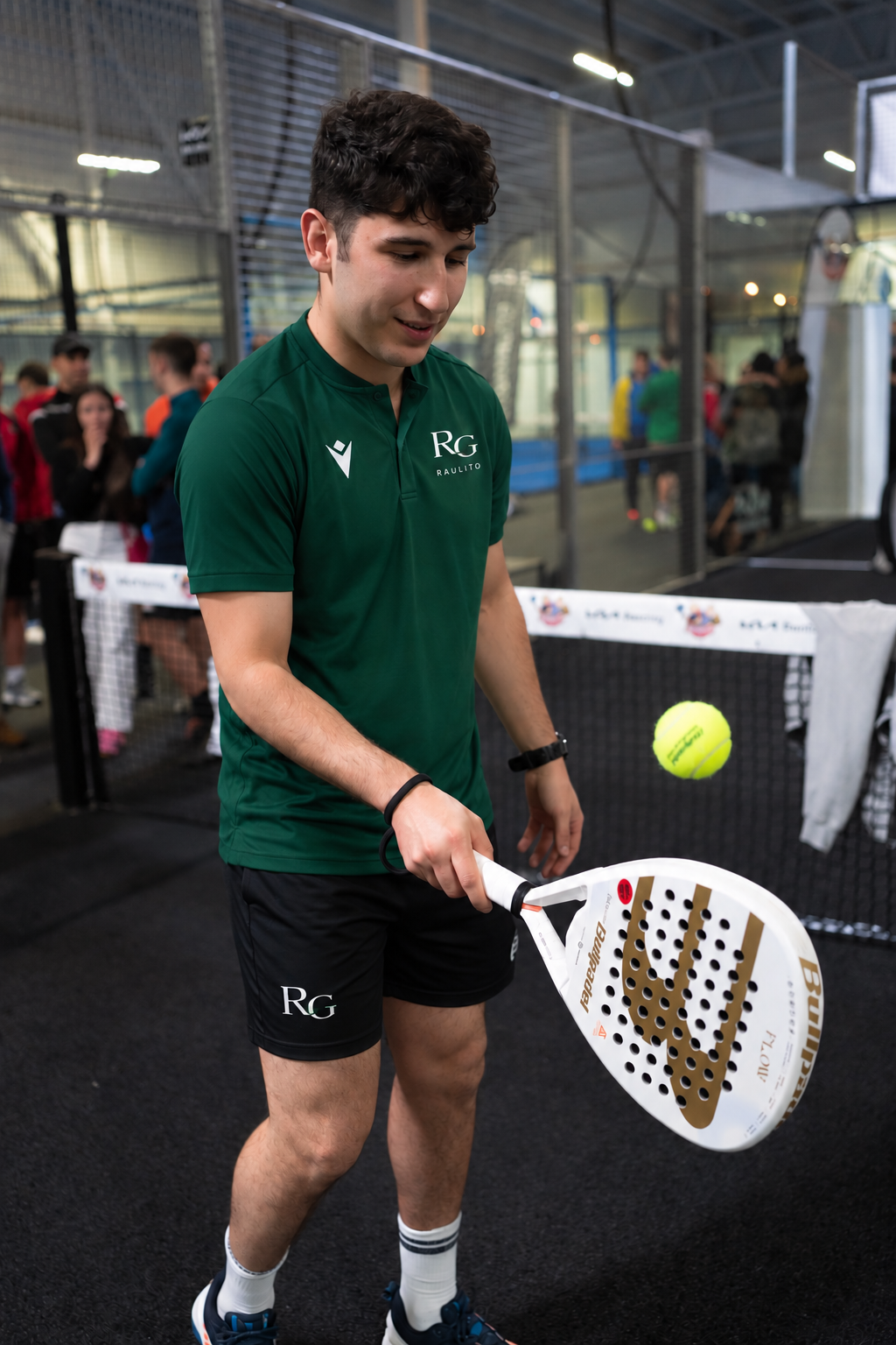 Raulito playing padel — RG Academia Hero
